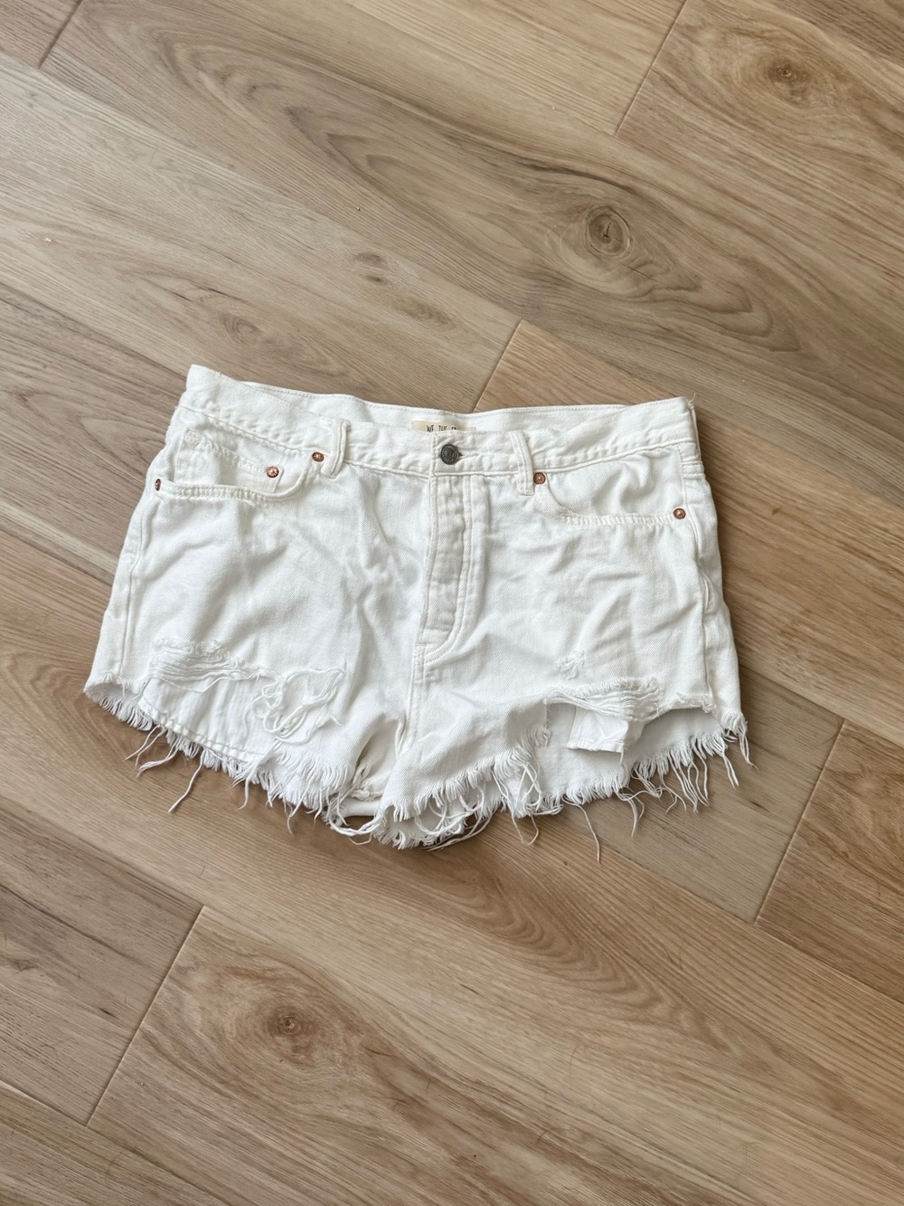 We The Free White Distressed Denim Cutoff Shorts